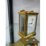 A ROBERT.S.ROBERTS PARIS BRASS CARRIAGE CLOCK.