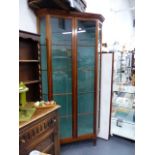 A MAHOGANY CORNER CABINET.