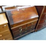 A GEORGIAN RED WALNUT SMALL BUREAU.