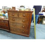 A VICTORIAN MAHOGANY CHEST OF DRAWERS.