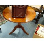 A MAHOGANY LAMP TABLE.