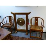 A PAIR OF CHINESE CARVED HORSESHOE SHAPE ARMCHAIRS OF CLASSIC STYLE WITH INSET RATTAN SEATS.