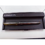 A PARKER 75 CISELE STERLING SILVER FOUNTAIN PEN WITH A 14K MEDIUM NIB, STERLING SILVER CROSSHATCH
