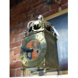A GEO.VI CORONATION LANTERN CLOCK, THE BACK DOOR BELOW THE CROWN TOP INSCRIBED DAVALL 1937,