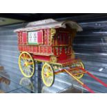 A SCRATCH BUILT TRADITIONAL MODEL FOUR WHEEL ROMANY WAGON WITH POLYCHROME DECORATION AND A SIMILAR