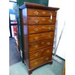 AN IRISH GEORGIAN MAHOGANY TALL CHEST OF SEVEN GRADUATED LONG DRAWERS STANDING ON BRACKET FEET. W.86