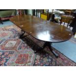 AN INLAID MAHOGANY D-END TWIN PEDESTAL DINING TABLE IN THE REGENCY TASTE, CENTRAL LEAF EACH PEDESTAL