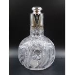 A VICTORIAN SILVER HALLMARKED AND CUT GLASS CLARET JUG DATED 1887 BIRMINGHAM FOR JOHN GRINSELL &