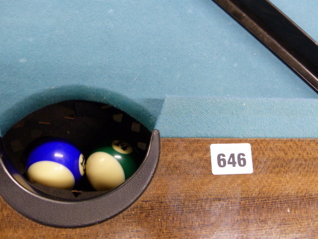 AN AMERICAN STYLE POOL TABLE AND BALLS. 115 X 205CMS.