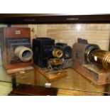 THREE PART MAGIC LANTERNS, AN EARLY PROJECTOR AND VARIOUS BLACK AND WHITE SLIDES OR NEGATIVE PLATES.