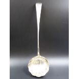 A GEORGIAN SILVER FLUTED LADLE DATED 1766 LONDON. WEIGHT 171GRMS.