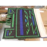 A NDEBELE GREEN, BLACK AND BLUE BEADED APRON, A PYGMY BLACK DECORATED BARK CLOTH OVERSKIRT AND A