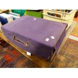 A VINTAGE FITTED PURPLE LEATHER DRESSING CASE BY FINNIGANS CONTAINING MONOGRAMMED SILVER TOP AND