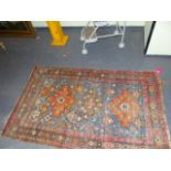 AN ANTIQUE CAUCASIAN RUG. 192 X 120CMS.