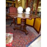 A VICTORIAN AND LATER MAHOGANY CENTRE TABLE WITH CARVED PEDESTAL TRIFORM PLATFORM BASE. DIA.113CMS.