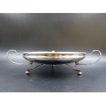 AN EDWARDIAN ART NOUVEAU SILVER HALLMARKED FOOTED AND HANDLED BOWL. DATED 1912 FOR SAUNDERS AND