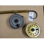 AN UNUSUAL FISHING GAFF WITH COMBINED SPRING SCALE, UNSIGNED TOGETHER WITH A J W YOUNG REEL AND