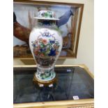 A FAMILLE VERTE BALUSTER VASE AND COVER ORMOLU MOUNTED AS A LAMP. H.53CMS.