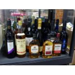 MIXED LOT WINE AND SPIRITS. THREE 1L. BOTTLES OF BELLS WHISKY AND ONE 75CL BOTTLE. BEEFEATER AND
