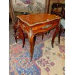 A FRENCH PARQUETRY INLAID ORMOLU MOUNTED 19TH.C.LOUIS XV STYLE WORK TABLE OF SERPENTINE FORM ON