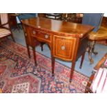 A LATE GEORGIAN INLAID MAHOGANY SMALL BOW FRONT SIDEBOARD WITH CENTRAL SHALLOW DRAWER FLANKED BY