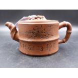 A YIXING TEAPOT WITH BAMBOO SPOUT AND HANDLES, THE TWO SECTION CYLINDRICAL BODY INSCRIBED ABOUT
