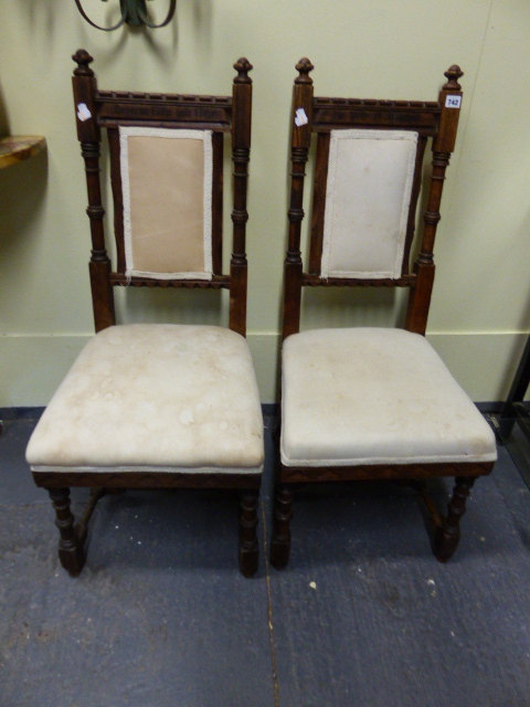 A PAIR OF INTERESTING CARVED OAK ARTS AND CRAFTS HALL CHAIRS WITH INSCRIPTIONS ON THE CREST RAILS,