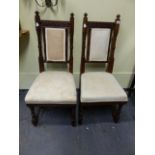 A PAIR OF INTERESTING CARVED OAK ARTS AND CRAFTS HALL CHAIRS WITH INSCRIPTIONS ON THE CREST RAILS,
