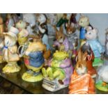 A QTY OF BEATRIX POTTER FIGURES TOGETHER WITH A PAIR OF GERMAN PORCELAIN FIGURES.