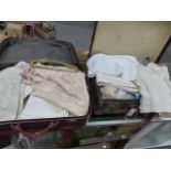 TWO SUITCASES CONTAINING BED AND TABLE LINEN AND LACE.