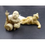 TWO JAPANESE IVORY FIGURES OF CHILDREN, ONE KNEELING BY A DRUM AND PUPPY. W.4CMS. THE OTHER