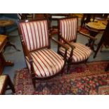 A PAIR OF FRENCH DIRECTOIRE STYLE CARVED ARMCHAIRS WITH UPOLSTERED BACKS AND SHAPED SEATS, ONE