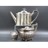 A GEORGIAN SILVER HALLMARKED TEAPOT DATED 1796 TOGETHER WITH A FURTHER SILVER TEAPOT DATED 1907