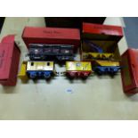 A COLLECTION OF HORNBY O GAUGE STOCK TO INCLUDE A FYFFES BANANA WAGON, A TRINIDAD TIPPING WAGON, A