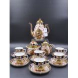 A CROWN DERBY 198 PATTERN IMARI SIX PIECE COFFEE SET WITH DATE CODE FOR 1889.