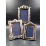 THREE SILVER HALLMARKED PHOTO FRAMES WITH VELVET BACKS, MEASURMENTS 12.5CMS X 9CMS, 12.5CMS X 8.5CMS