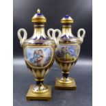 A PAIR OF 19TH.C.SEVRES STYLE TWO HANDLED VASES AND COVERS, THE WHITE BEAD FRAMED RESERVES ON ONE