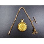 AN 18K GOLD STAMPED ANTIQUE FOB WATCH WITH A 9CT GOLD VICTORIAN ENGRAVED POCKET WATCH CHAIN, T-BAR