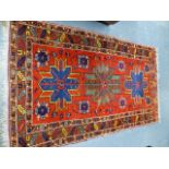 AN ANTIQUE CAUCASIAN RUG. 212 X 127CMS.