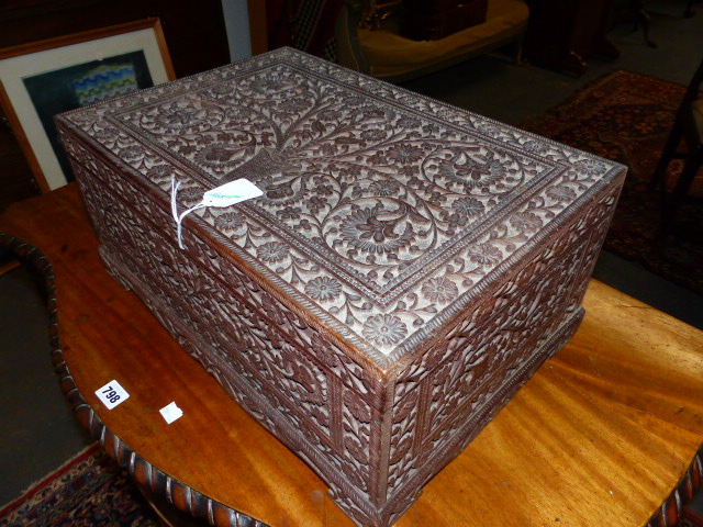 AN ANGLO INDIAN ELABORATELY CARVED HARDWOOD WORK BOX WITH LIFT TOP AND MIRROR BACK ENCLOSING - Image 3 of 4