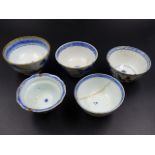 FIVE CHINESE BLUE AND WHITE PORCELAIN TEA BOWLS.