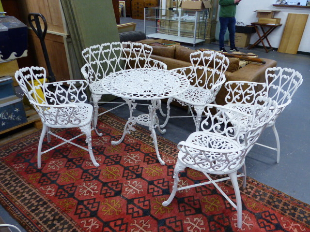 A GOOD VICTORIAN STYLE CONSERVATORY/ PATIO SET OF FOUR CHAIRS, A TWO SLAT BENCH AND A CIRCULAR