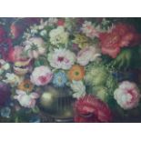 19TH/20TH.C. ITALIAN SCHOOL. AN URN FILLED WITH SUMMER FLOWERS, OVAL OIL ON CANVAS IN CONFORMING
