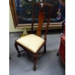 A CARVED AND INLAID GEORGIAN CHAIR WITH FLORAL MARQUETRY PANELS TO BACKSPLAT, CABRIOLE LEGS THAT END