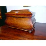 A LARGE EARLY VICTORIAN INLAID BURL WALNUT BOMBE TEA CADDY WITH FITTED INTERIOR ON BUN FEET. W.