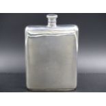 A SILVER HALLMARKED HIP FLASK DATED 1976 FOR CHARLES S. GREEN & CO LTD. WEIGHT 213GRMS.