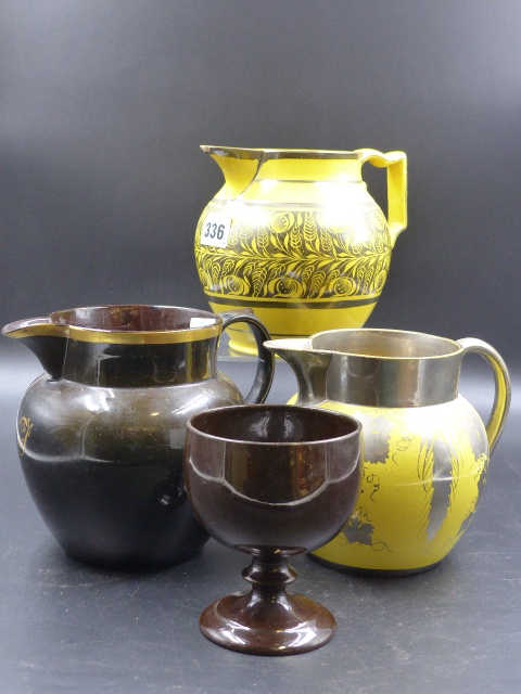 TWO ANTIQUE SILVER LUSTRED YELLOW GROUND JUGS, A BROWN GOBLET AND JUG WITH GILT INITIAL J.