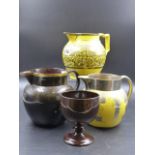 TWO ANTIQUE SILVER LUSTRED YELLOW GROUND JUGS, A BROWN GOBLET AND JUG WITH GILT INITIAL J.