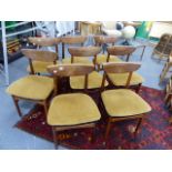 A SET OF EIGHT DYRLUND MID CENTURY DINING CHAIRS. (8)