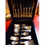A SILVER HALLMARKED CASED CANTEEN OF CUTLERY OF FIDDLE SHELL AND SCROLL DESIGN, VARIOUSLY DATED